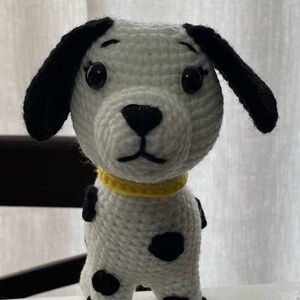 Handmade crocheted Dalmatian dog with yellow collar